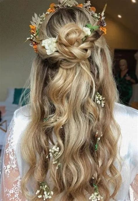 Dreamy 2026 Bridal Braids: Floral Accents and Timeless Romance for Long Hair
